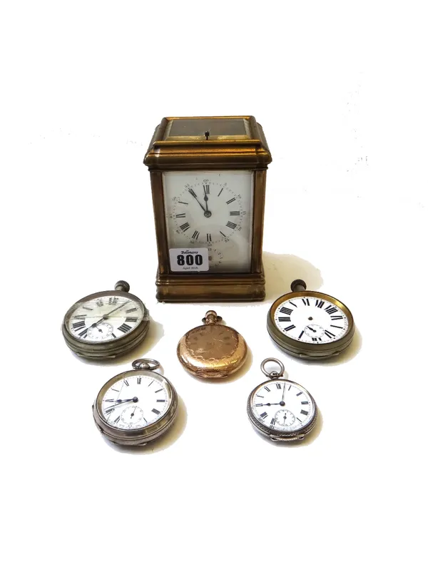 A brass cased repeating carriage clock with an alarm, the enamelled dial with black Roman hour numerals, outer Arabic minute numerals and with a subsi