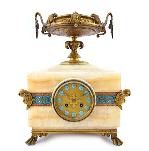 A Napoleon III ormolu and champleve enamel decorated onyx striking mantel clock, circa 1870, the rectangular case surmounted by an urn with foliate ca