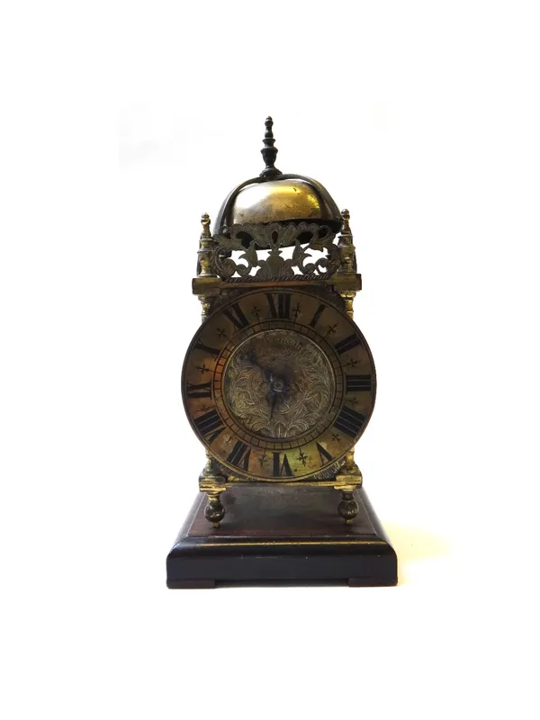 A brass cased lantern clock, E Stanton, London, 19th century, of typical form with a French two train movement and retailers stamps for Payne & Co 163