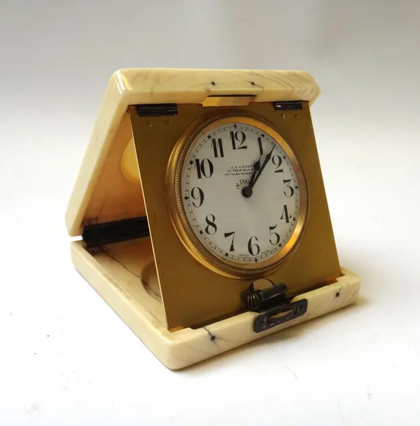 An ivory cased travel eight day clock, the dial detailed J.C. Vickery 9.5cm high.