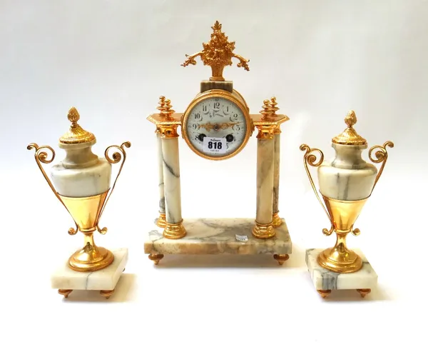 A Continental marble and ormolu mounted clock garniture, late 19th century (re-gilded), the drum supported on four pillars on a rectangular plinth and