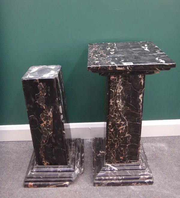 A pair of 20th century marble columns, each with square top, column and base, 35cm wide (a.f).