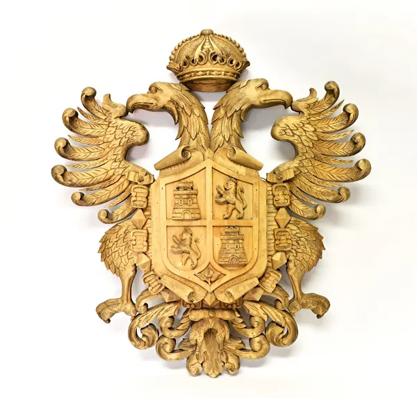 A modern softwood carved heraldic crest with crown surmount over two Prussian eagles with a shield to the foreground, 80cm high.  Illustrated