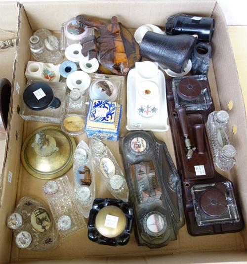 A crested ware porcelain 'City of London' inkwell, 14cm wide, a patinated spelter inkwell cast and titled as 'Notre Dame', 20cm wide, a white metal no