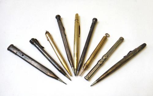 A vintage 'Lifelong' sterling silver propelling pencil, 12cm, an S. Mordan sliding pencil, a Lifelong rolled gold propelling pencil, two further sterl