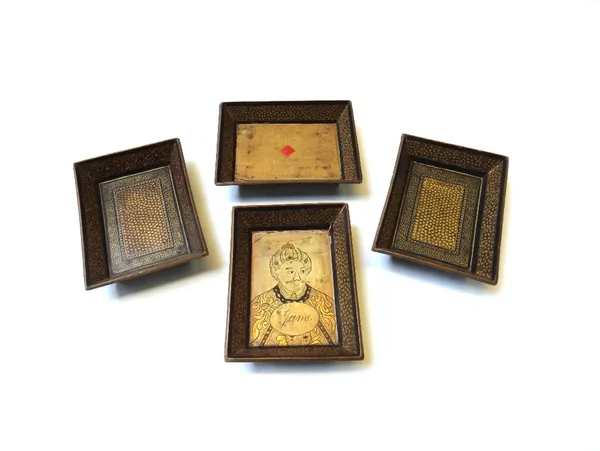 A set of four Persian papier mache gaming counter trays, 19th century, one gilt decorated with a Persian king and titled 'Game', the others of plain f