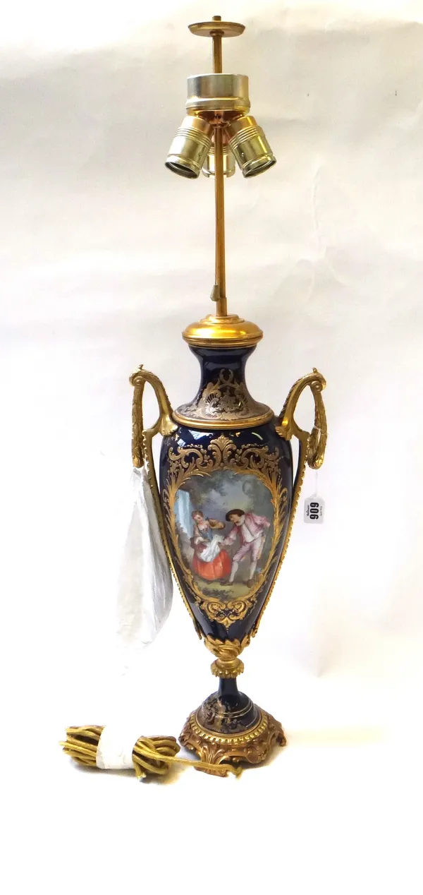 A Sevres style dark blue ground gilt metal mounted vase (table lamp), decorated with gallant and companion within a gilt foliate cartouche and with la