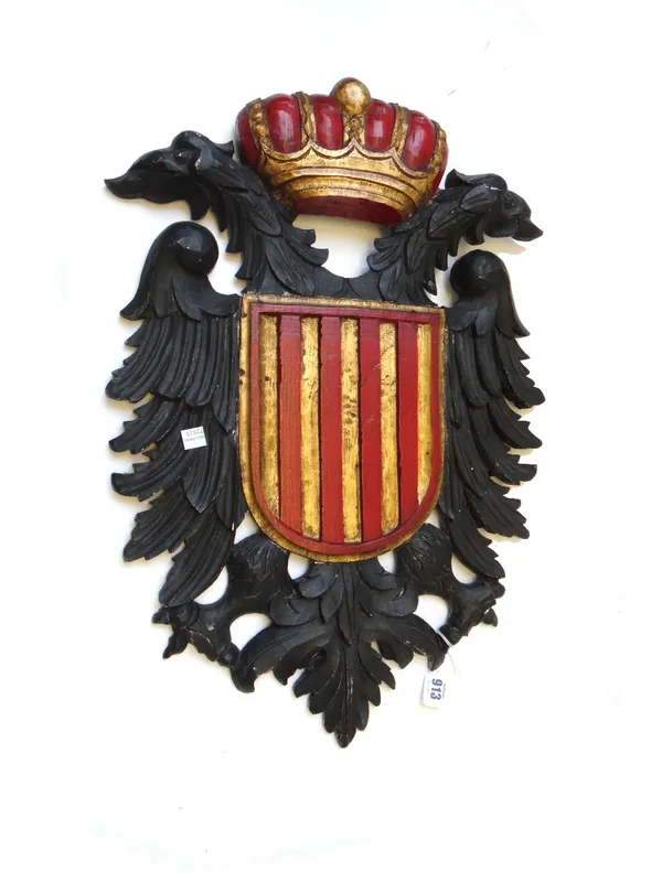 A modern polychrome carved wooden wall panel detailed as a Prussian heraldic crest (60cm high), a modern carved hardwood photograph frame detailed all