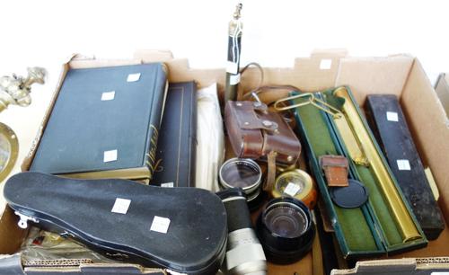 A quantity of collectables to include a table fan, wireless radio manuals, a camera and accessories, a compass, a toy violin and a collection of scien