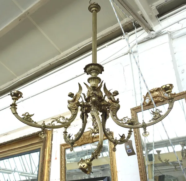 A gilt brass five branch chandelier, late 19th century, with a central Corinthian column over five figural arms of Gothic form, supporting clear glass