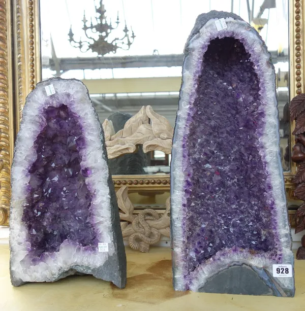 Two split amethyst geodes each of hollow concave form, 51cm high (2).