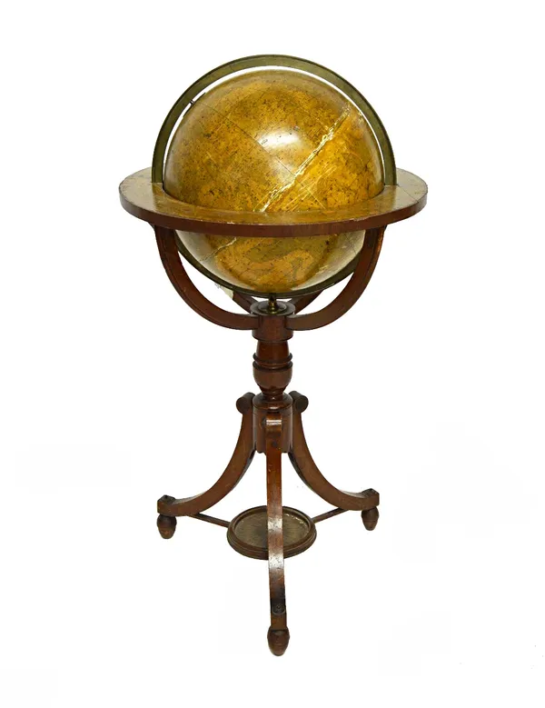 A Regency celestial globe, by Newton & Son on a mahogany triform base, (a.f.) globe 40cm diameter, 103cm high.  Illustrated
