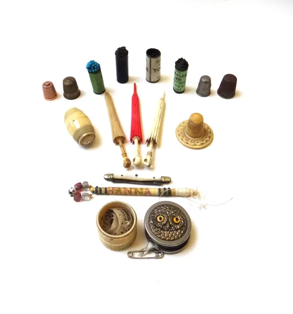 A quantity of sewing related collectables, including; a 9ct gold thimble (a.f), a novelty owl tape measure, three umbrella shaped Stanhope ivory needl