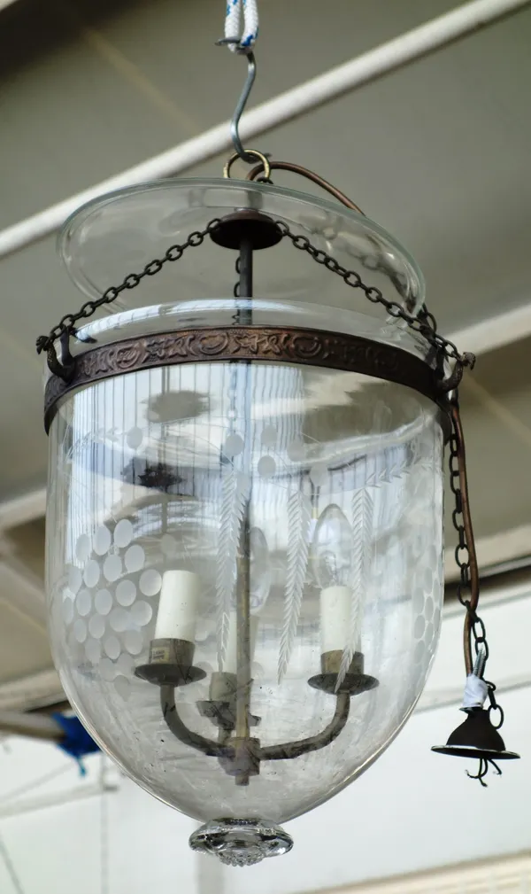 A glass hundi style lantern, early 20th century, with etched decoration and internal three light fitting suspended on linked chains (the bowl 36 cm hi