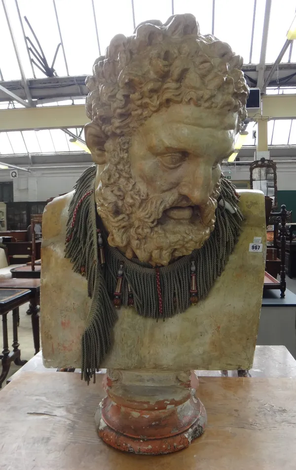 A large polychrome painted terracotta bust, 20th century, modelled as a bearded Grecian God, on a socle, 93cm high.