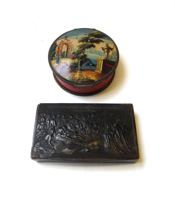 A rectangular horn snuff box, relief carved with Napoleon on his death bed, dated 1840 (9.5cm wide), a 19th century circular papier mache snuff box ti
