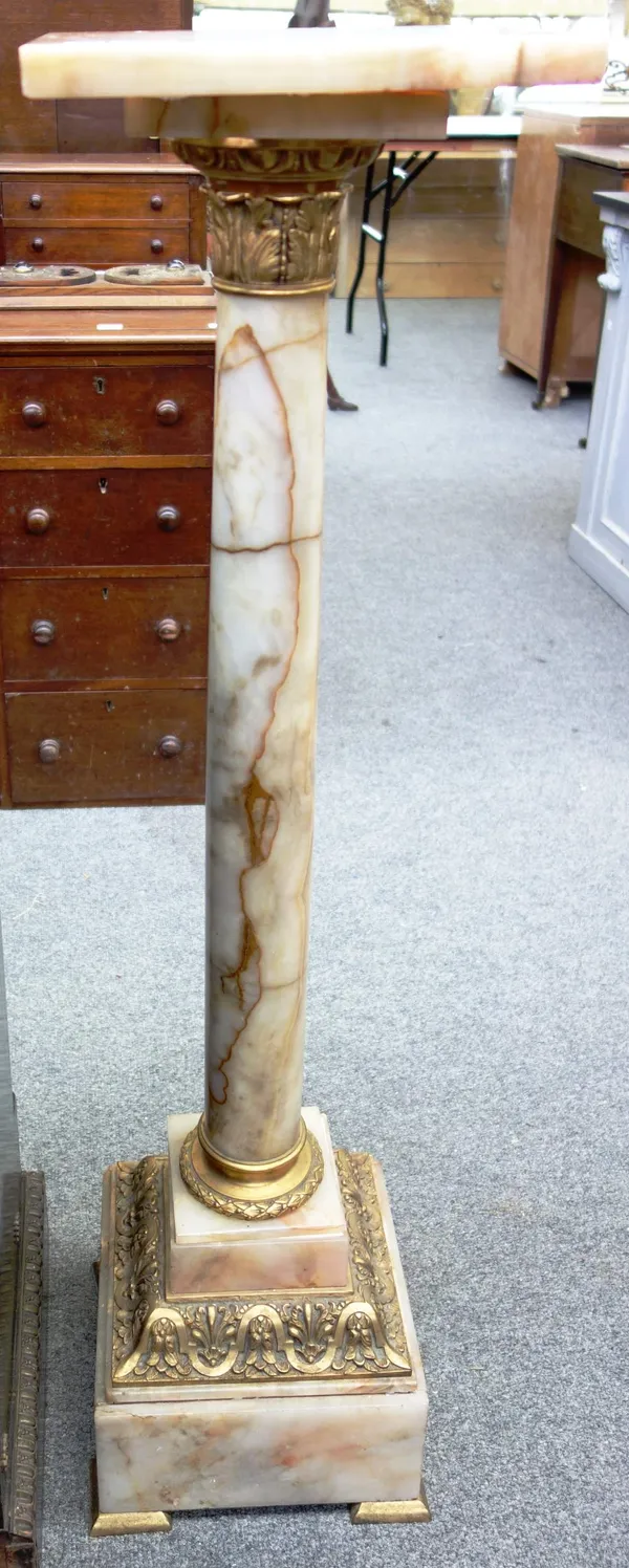 A gilt metal mounted marble column/jardiniere stand, 107cm high.