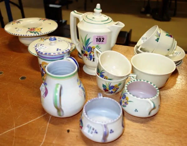 A quantity of Poole pottery to include;  an 11 pieces matched tea set, sifter, 2 mushroom shaped vases and 3 other items. (qty)
