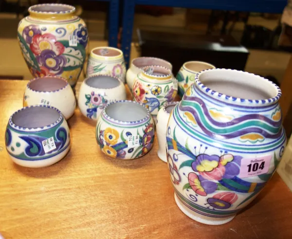 A quantity of Poole pottery vases to include; medium size vase decorated by YO and 12 others (13)
