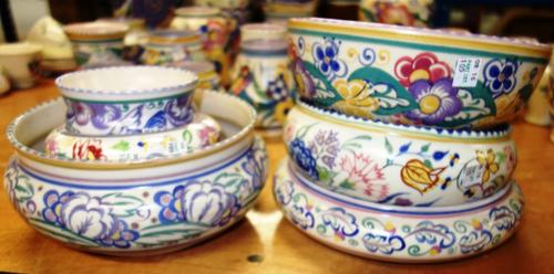 A quantity of Poole pottery bowls to include;  pedestal footed bowl and 7 others (8)