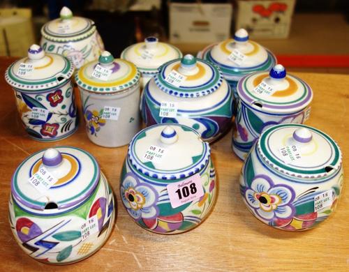 A quantity of Poole pottery comprising;  comprising 10 lidded jam and butter pots (10)