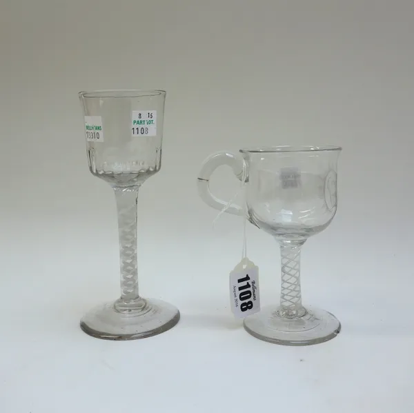 An opaque twist wine glass, circa 1760, with moulded bucket bowl and wide foot, 16cm, and an 18th century style custard cup (a.f). (2)