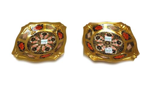 A pair of Royal Crown Derby Imari footed dishes, early 20th century, each with moulded bird borders, 16cm wide. (2)