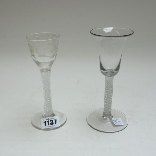 An opaque twist wine glass, circa 1765, the ogee bowl engraved with flowers, raised on a double series opaque twist stem and plain foot, 15cm.high; an