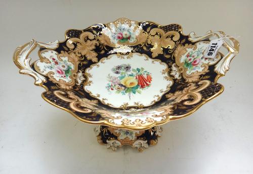 A good Ridgway porcelain dessert service, circa 1850, painted in the centres with flower bouquets against a deep cobalt blue ground reserved with flow
