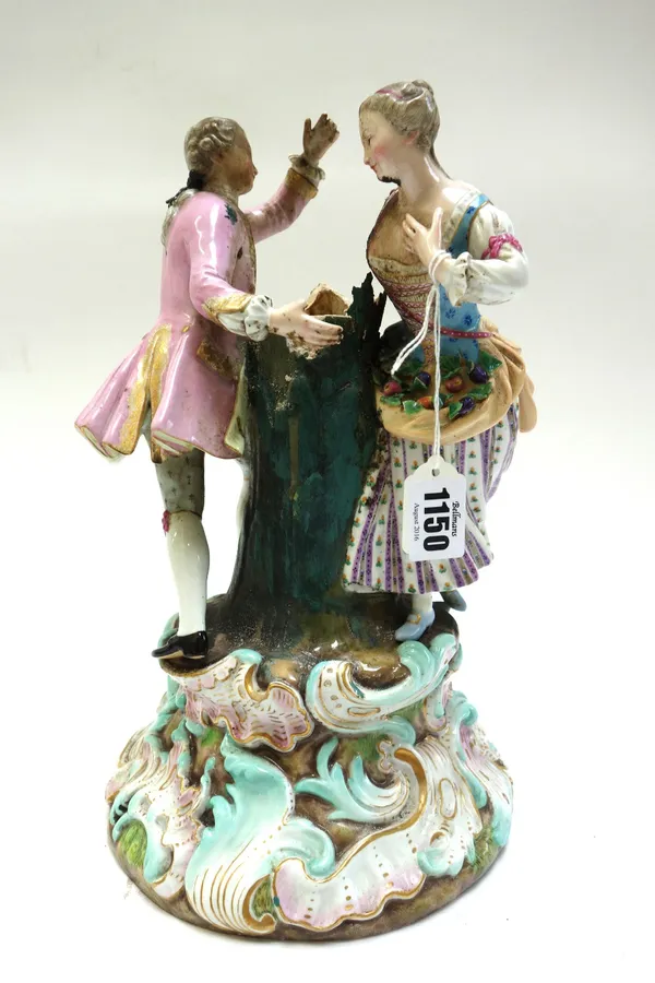 A Meissen outside decorated centrepiece, late 19th century, modelled as a gallant and companion dancing around a tree stump, with cancelled crossed sw