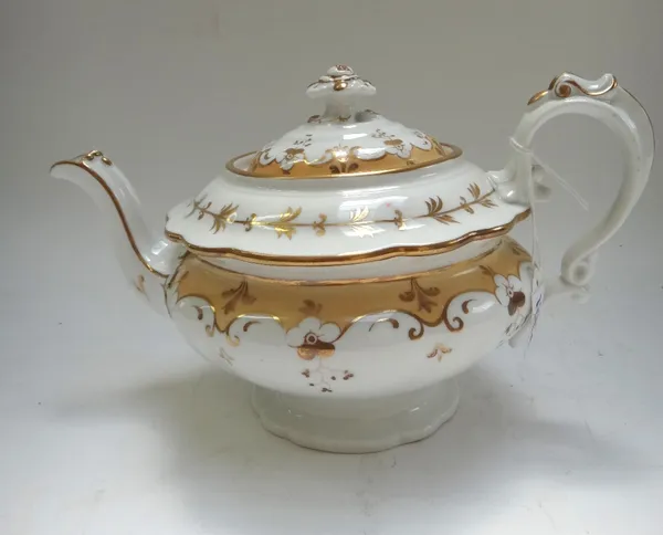 A group of Ridgway porcelain part tea and coffee services, circa 1840, each with apricot borders and gilt floral decoration, comprising; three teapots