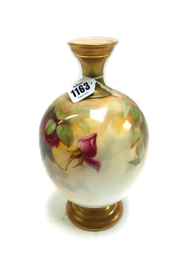 A Royal Worcester porcelain vase by Sedgley, circa 1913, painted with roses against a gilt and blush ivory ground, with puce printed mark, 26.5cm high