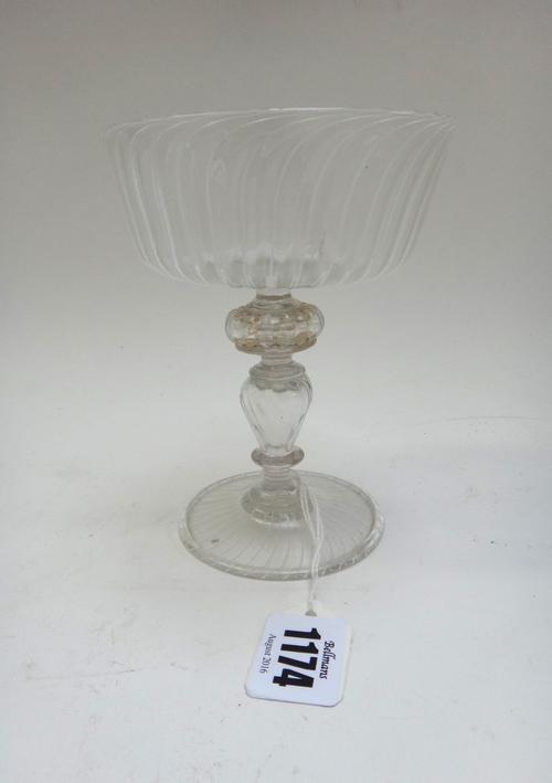 A group of eleven Venetian drinking glasses, possibly Salviati, late 19th/early 20th century, in three sizes, each with ribbed bowl and raised on a ba