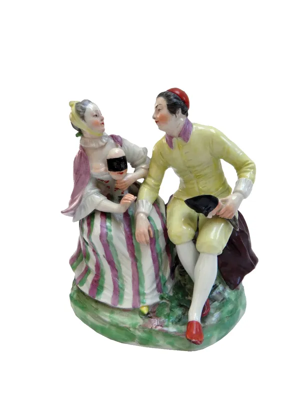 A Vienna group of two Masqueraders, circa 1755, with blue shield mark, painter's numerals '30' to the footrim, the figures possibly Pantalone and Colu