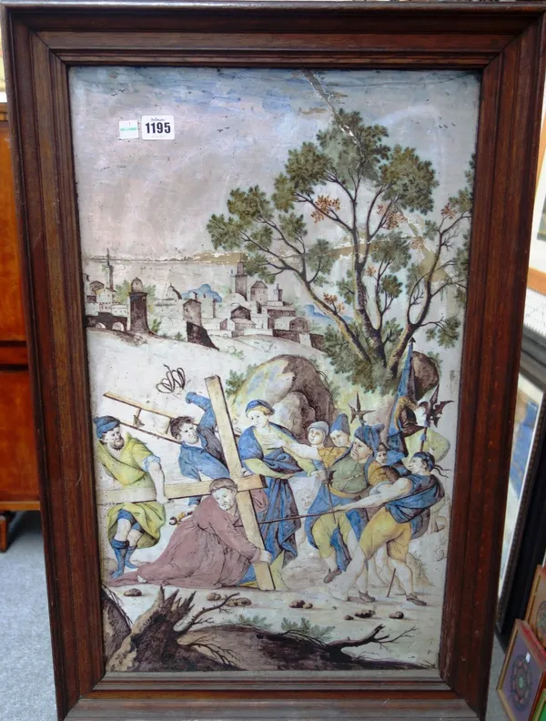 An Italian maiolica plaque, mid 18th century, possibly Sienna, painted with Christ carrying the cross, mounted in a wooden frame (a.f), 66cm x 39cm.