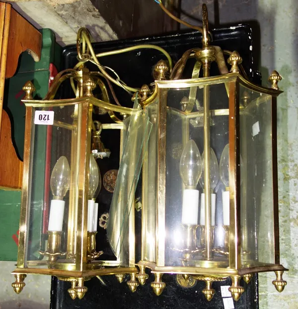 A pair of 20th century serpentine hexagonal brass hanging lanterns, (2).