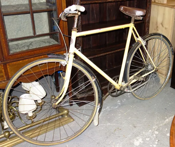 A yellow men's 'F H Grubb' bicycle.