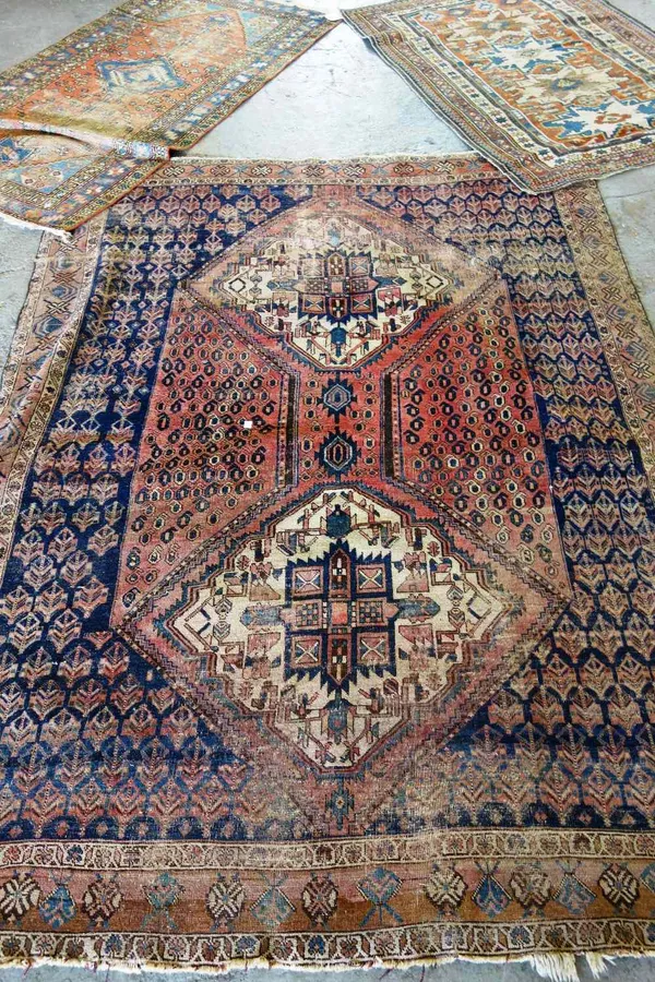 A Neris rug, 220cm x 163cm, a Lesghistan rug, Caucasian, 147cm x 107cm and a Mahal rug, 175cm x 91cm. (3)