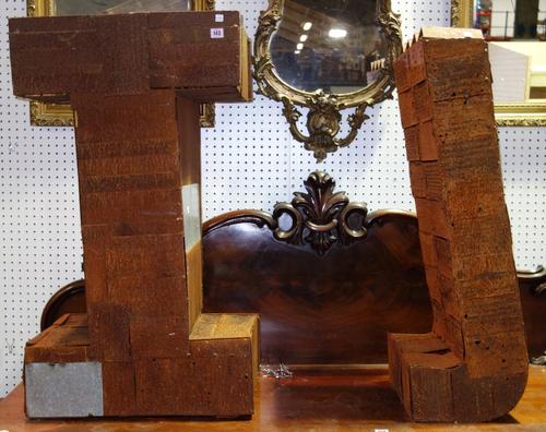 A pair of large iron three dimensional letters; 'I' and 'J'. (2)