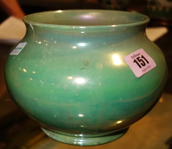 A green lustre Moorcroft vase.