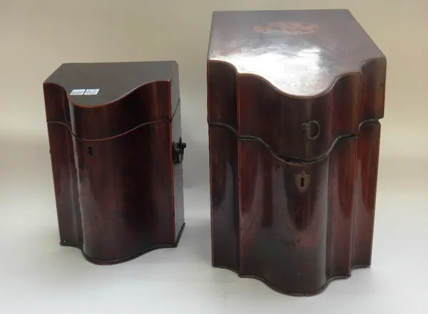 A George III inlaid mahogany slope front knife box, the serpentine lid revealing original fitted interior, 22cm wide, together with a similar smaller,