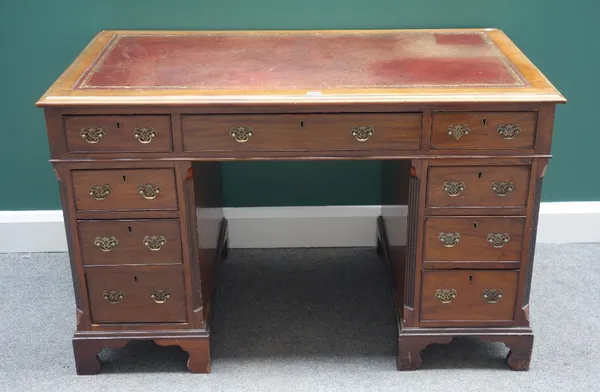 A 19th century mahogany pedestal desk with nine drawers about the knee, on bracket feet, 121cm wide.