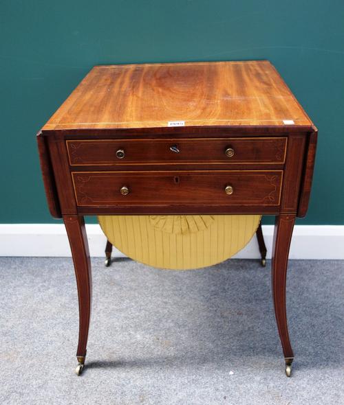 A George III inlaid mahogany writing/work table, the drop flap top with a pair of frieze drawers, one with fitted writing interior, over a pull-out wo
