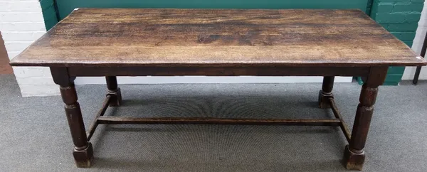 A 17th century style oak refectory table, on turned supports united by 'H' frame stretcher, 90cm wide x 206cm long.