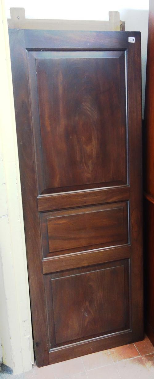 A George III mahogany knock down wardrobe, with pair of triple panel doors on ogee bracket feet, 132cm wide x 200cm high.