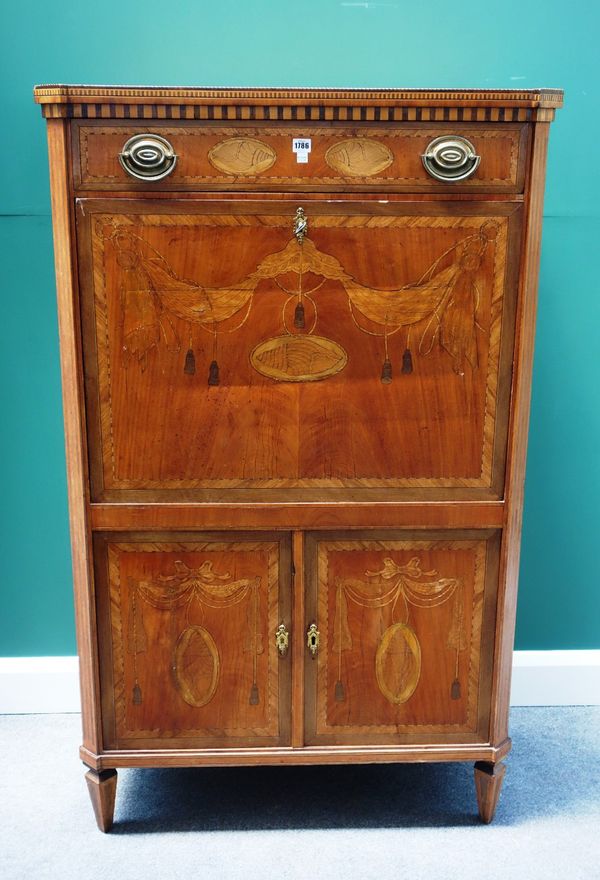 A 19th century Continental marquetry inlaid mahogany secretaire a abattant, the single drawer over fall front revealing a fitted interior, over a pair