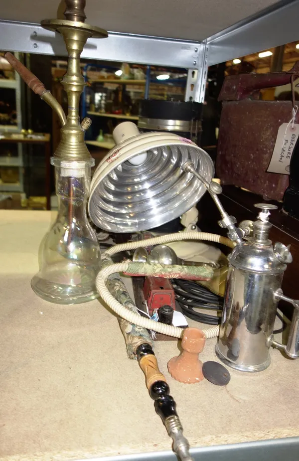 A group of collectables including a large thermos flask, a cream painted metal desk lamp, a cuckoo clock, a chrome atomizer, a hookha pipe and sundry.