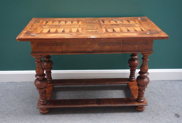 A 19th century German fruitwood and walnut marquetry inlaid side table, with single frieze drawer, on beehive turned supports united by perimeter stre