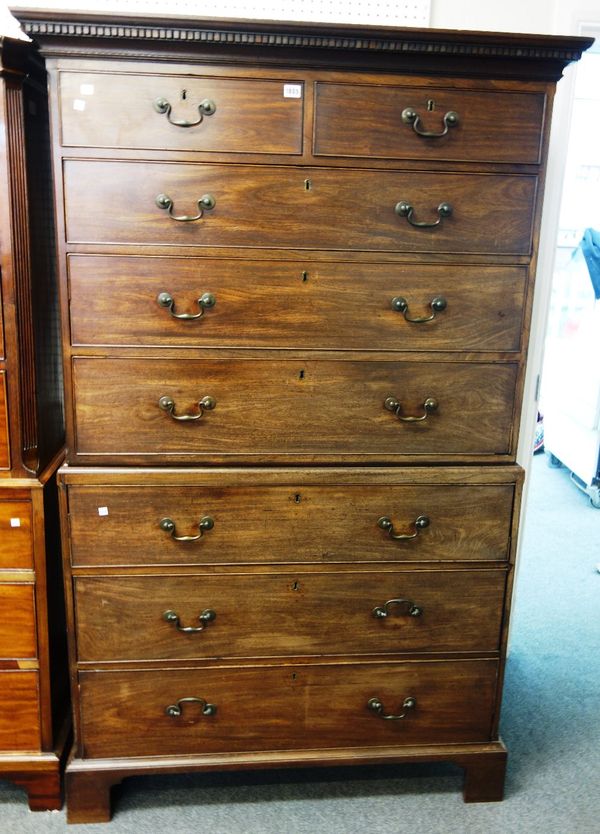 A George III mahogany chest-on-chest of two short over six long graduated drawers, on bracket feet, 113cm wide x 183cm high.