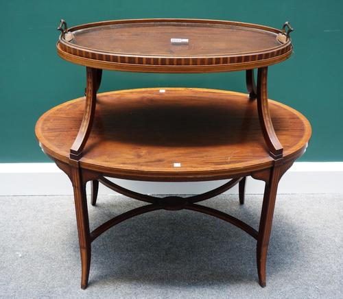 A 19th century satinwood banded mahogany oval two tier etagere, with lift-off tray upper section, 89cm wide.
